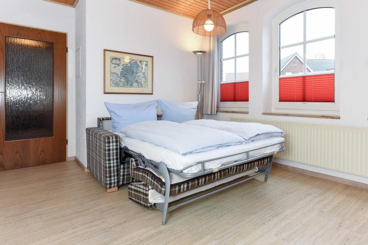 Ferienwohnungen Im Gezeitenhaus Bensersiel Exteriör bild